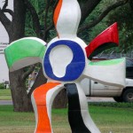 Movement is the theme of this sculpture. It is colorful and resembles a person stepping forward.