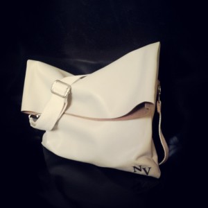 White in the winter has always had a luxurious feel to it. It can be as bold as red in a sea of black. Here is the new winter white leather NV Victoria clutch with a detachable/ adjustable cross body strap.